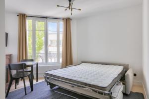 Appartements Appartement 2 Pieces I 8 min a pied de la Defense : photos des chambres