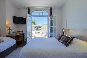 Superior Triple Room room in Logis Hotel l'Esterella