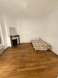 Appartements Charmant appartement proche Paris : photos des chambres