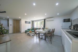 Appartements Le Jardin Secret Nature Spa parking jardin 1500m2 : photos des chambres