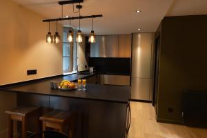 Appartements Le Rustique : photos des chambres