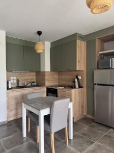 O'petit nid sauge T2 45m place de parking - 4hvězdičkové hotely ve městě Aix-les-Bains