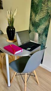 Appartements Studios Izicozy I Confort et jardin en ville, proche gare I 2 et 4 pers : photos des chambres