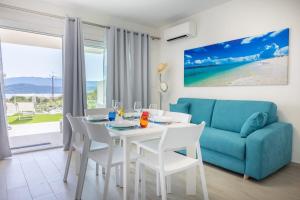 Domusmeralda - Stella Marina - Appartamento con Giardino, Piscina e vista Mare