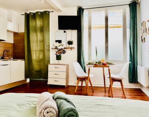 Appartements B & Bulle - Entre centre et gare - : photos des chambres