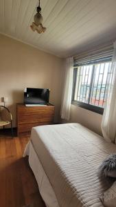 Amplia casa 7 personas 2 cocheras