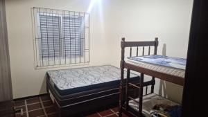 Casa a duas quadras da praia - Balneário Saint Etienne - Matinhos