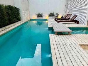 Impeccable and bright with a pool and gym