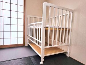 伊の屋 駅徒歩2分難波商圏空港直通住宅区戸建最大16人