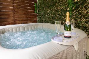 Appartements Le Jardin Secret Nature Spa parking jardin 1500m2 : photos des chambres