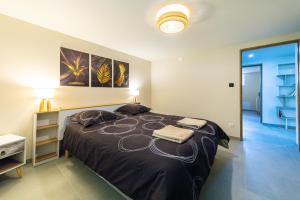 Appartements Le Jardin Secret Nature Spa parking jardin 1500m2 : photos des chambres