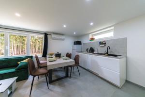 Appartements Le Jardin Secret Nature Spa parking jardin 1500m2 : photos des chambres