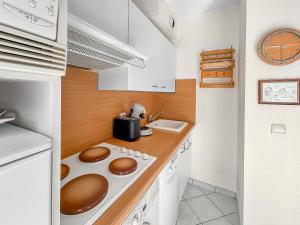 Appartements La Pause Cabourgeaise : photos des chambres