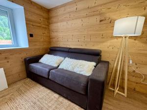 Appartements Appartement ambiance chalet avec video-projecteur : photos des chambres