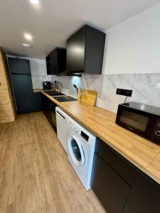 Appartements Appartement ambiance chalet avec video-projecteur : photos des chambres