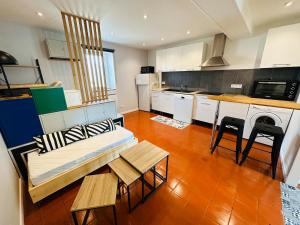 Appartements Chez Auguste - charmant studio 3 etoiles : photos des chambres