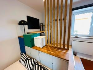 Appartements Chez Auguste - charmant studio 3 etoiles : photos des chambres