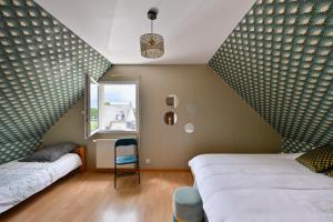 Maisons de vacances La Maison d-Herbignac - Grand Jardin : photos des chambres