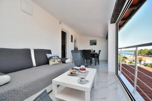 Three-Bedroom Apartment room in Apartments Ester