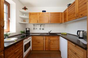 Ferienhaus May App 1