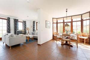 Ferienhaus May App 1