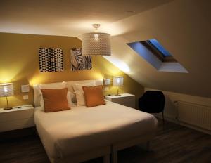 Hotels Hotel Restaurant Les Capucins : photos des chambres