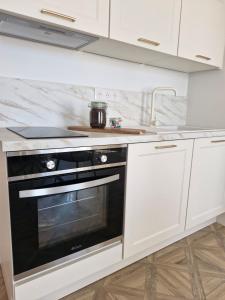 Appartements L-audacieuse-Jacuzzi et sauna , miroir suspendu : photos des chambres
