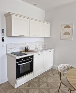 Appartements L-audacieuse-Jacuzzi et sauna , miroir suspendu : photos des chambres