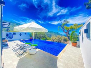 Villa Irmak İslamlar, Villa Yağmur Üzümlü