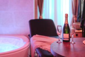 Appartements Suite Jungle Spa - Sauna & Balneo : photos des chambres