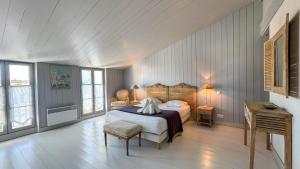 Villas Magnifique maison de village rhetaise : photos des chambres