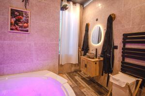 Appartements Suite Jungle Spa - Sauna & Balneo : photos des chambres