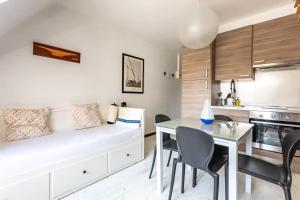 Le Capucin - Petit duplex avec place de parking