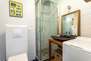 Appartements Le Capucin - Petit duplex avec place de parking : photos des chambres