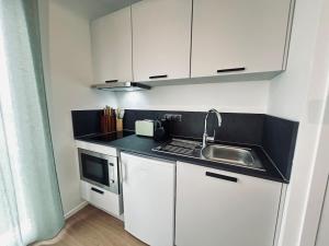 Appartements 602 Studio equipe a 2 pas du centre ville et gare : photos des chambres