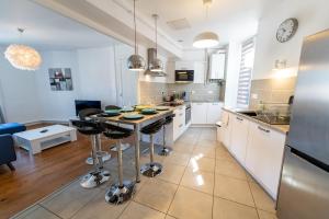 Appartements KASA ZAMBEZE - Spacious - Equipped - Wi-Fi : photos des chambres