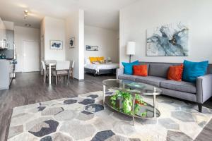 1BR City Loft With Modern Glass Views