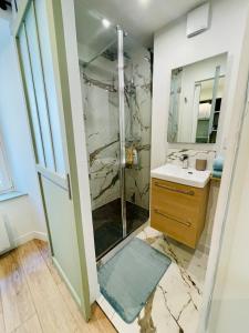 Appartements Studio L-Emeraude : photos des chambres