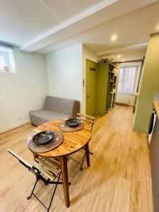 Appartements Studio L-Emeraude : photos des chambres