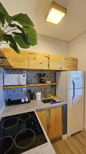 Loft Santorini no centro com Café da manhã