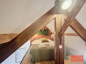 Appartements La passerelle, duplex atypique de charme : photos des chambres
