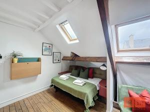 Appartements La passerelle, duplex atypique de charme : photos des chambres