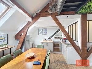 Appartements La passerelle, duplex atypique de charme : photos des chambres