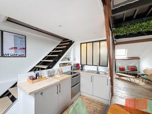 Appartements La passerelle, duplex atypique de charme : photos des chambres