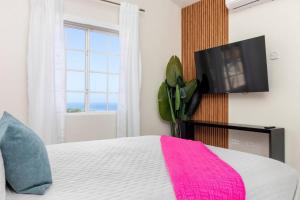 Sunset at ArecaHomes Beach Access Pool and Water Park