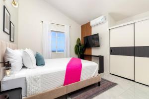 Sunset at ArecaHomes Beach Access Pool and Water Park