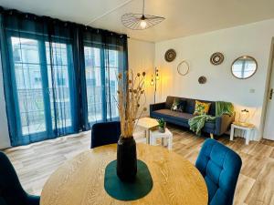 Appartements Le Petit S - Disneyland - Parking gratuit : photos des chambres