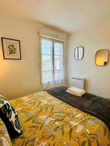 Appartements Le Petit S - Disneyland - Parking gratuit : photos des chambres