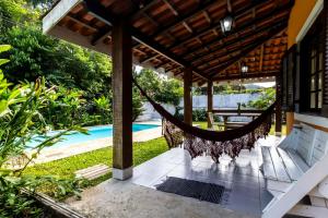 Casa com piscina a 500m da Praia de Boicucanga