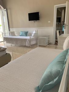 Chambre Triple - Vue sur Jardin